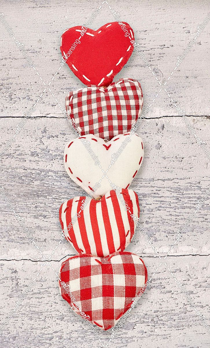 Five Red and White Fabric Hearts