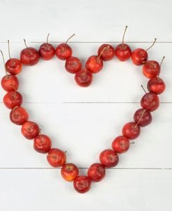 Apple Heart on White Wood