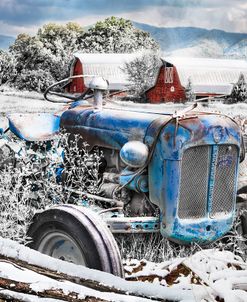 Blue Tractor at the Twin Barns in Snow
