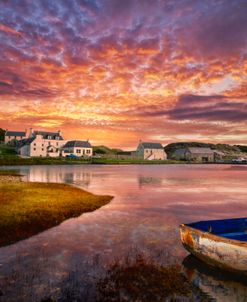 Rowboat in the Marshland at Sunset