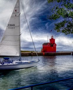 Sailboat at the Holland Harbor Lighthouse