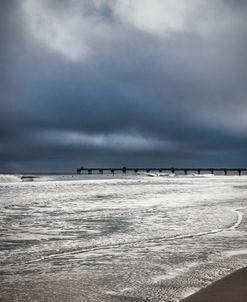 Surfers along the Pier Jacksonville Florida