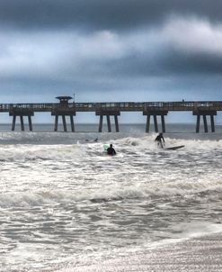 Surfers at the Pier Jacksonville Florida