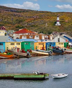 Fishing Houses And Boats In The Harbor