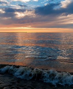 Light Clouds Sunset And Crashing Waves