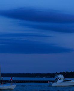 Cloudscape At Dusk With Two Boats