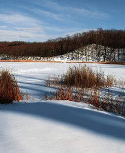 Clouds Over Frozen Pond With Snow