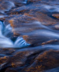 Colorful Stones And Silky Water