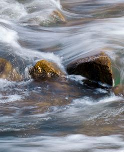 Water Swirling Over Rocks
