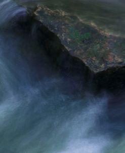 Pointed Rock Around Swirling Water