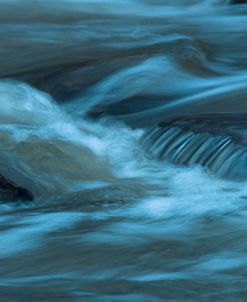 Water Twisting Around Boulders