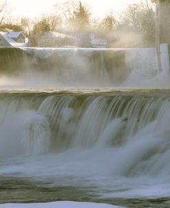 Waterfalls And Dam In Winter