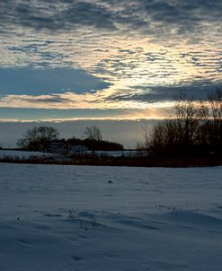 After Sunset Over Snow Covered Farm Land