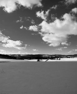 Clouds Over Snow Covered Landscape