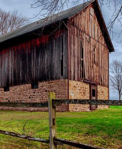 Weathered Barn Under Threatening Sky