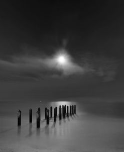 Eighteen Pilings Beneath the Rising Moon