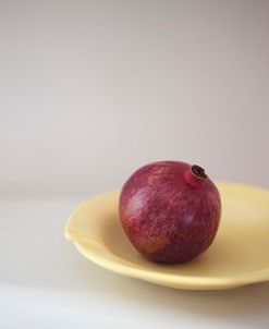 Pomegranate in a Yellow Bowl