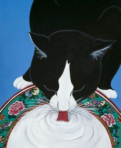 Lapping Milk From An Oriental Plate