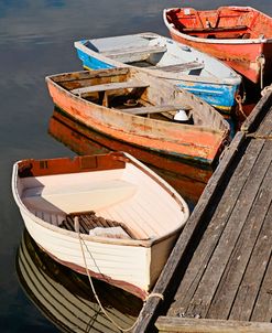 Dinghies Along The Dock