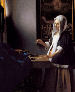 Woman Holding a Balance – Vermeer