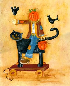 Scarecrow Pumpkin Head Sitting On Cat