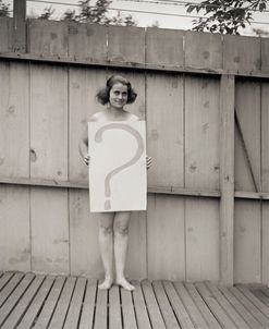 Unclothed Woman Behind Question Mark Sign