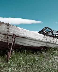 Old Boat Photograph with a Blue Sky