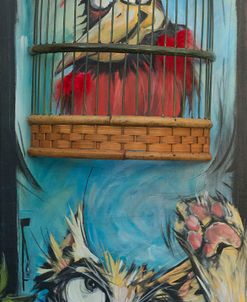 Bird In Cage With Cat